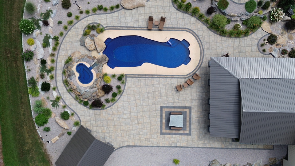 Custom Pool Patio with Natural Stone Features